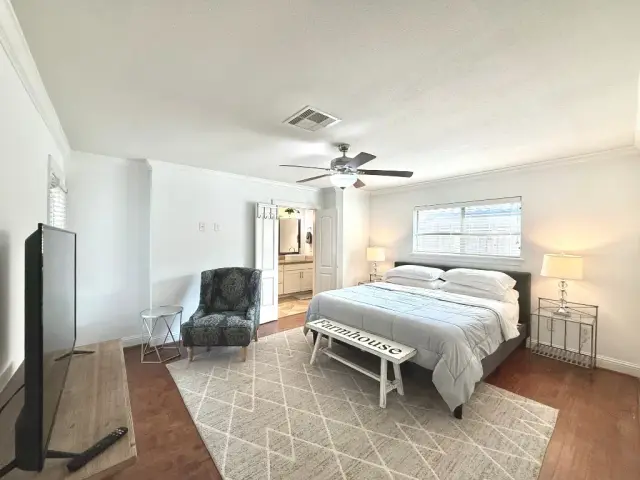 Casa Emilio primary bedroom, furnished house in Texas Medical Center / Meyerland, Houston — luxury furnished housing in Houston