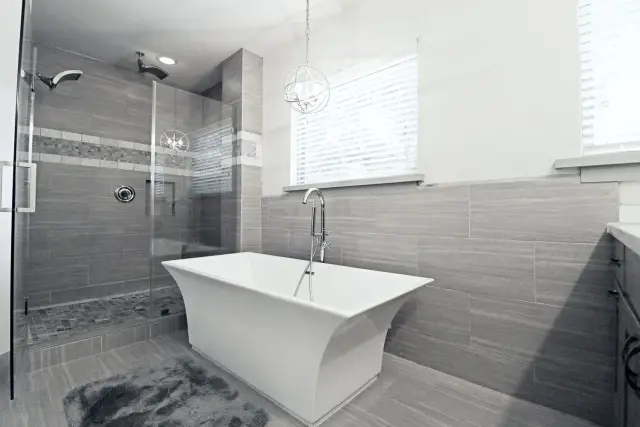 Chateau Gold primary bathroom, furnished house in Texas Medical Center / West University, Houston — luxury furnished housing in Houston