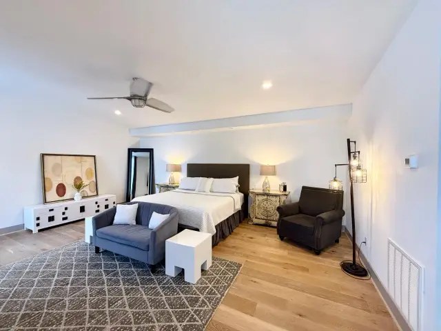 Villa Rica primary bedroom, furnished house in Texas Medical Center / Meyerland, Houston — luxury furnished housing in Houston